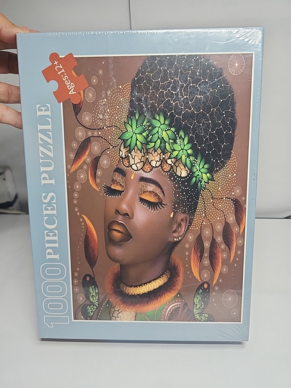 1000-piece jigsaw puzzle featuring artwork of a woman with Afrocentric